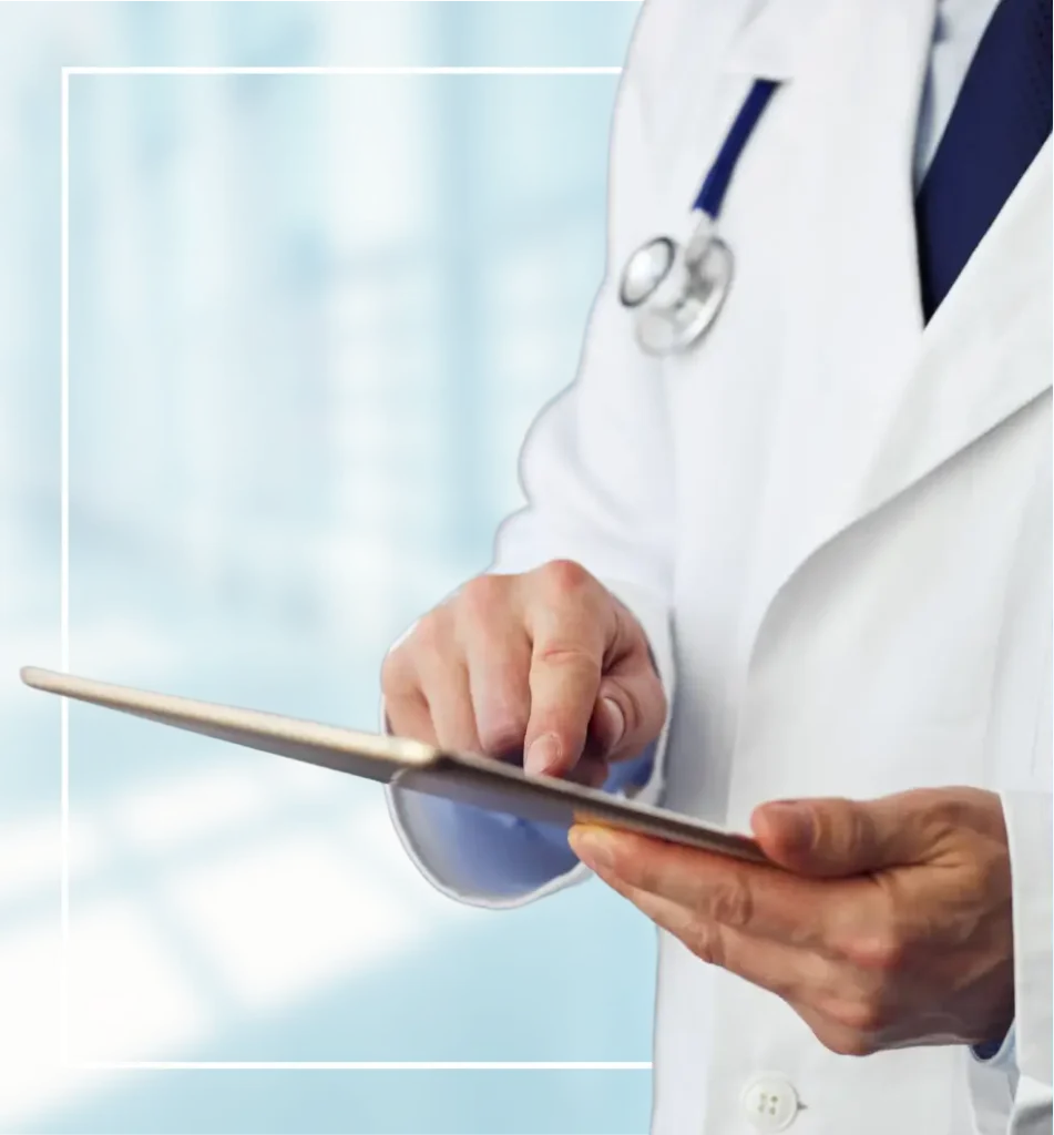 Doctor using a tablet device