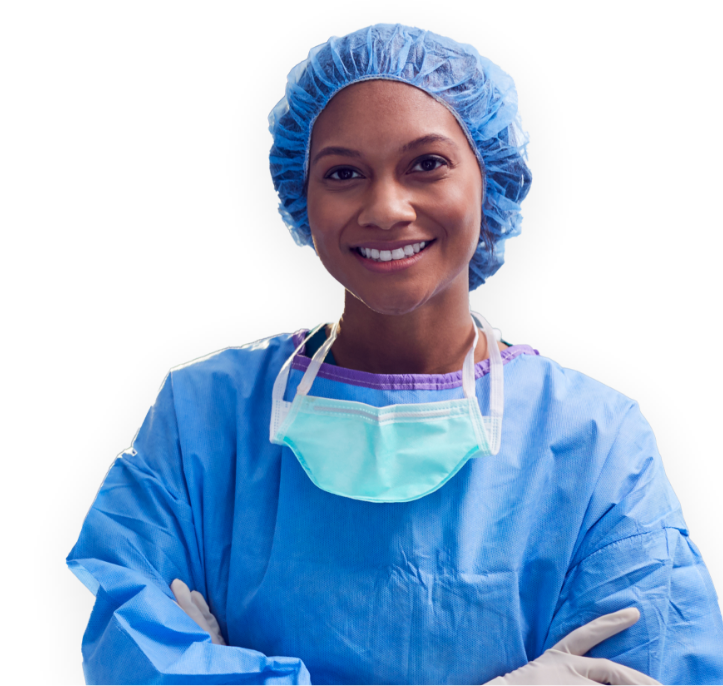 Woman in blue scrubs with arms crossed